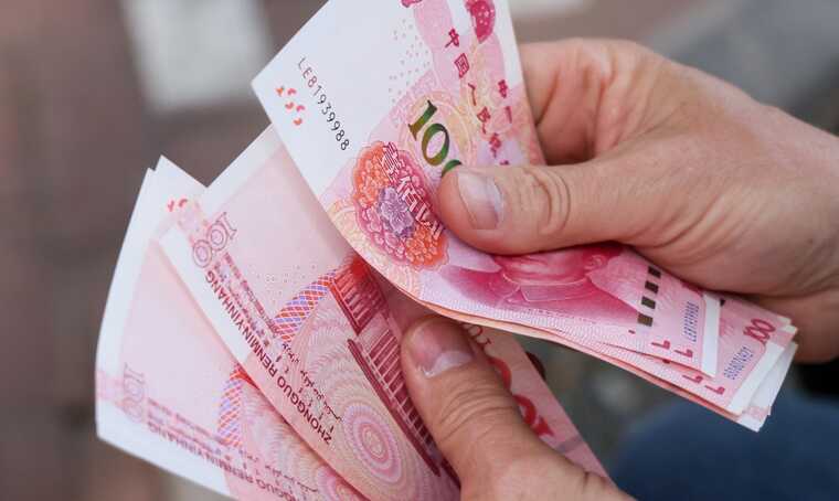 Китай стремительно отказывается от монет и банкнот